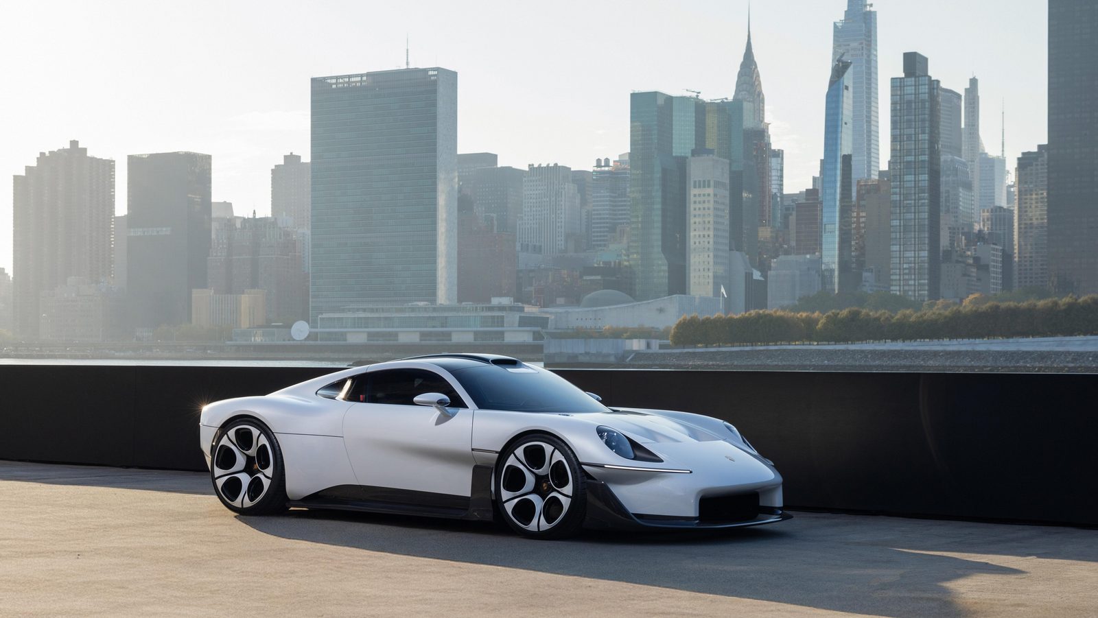 Porsche Mission S on the pier in Queens with Manhattan in the background
