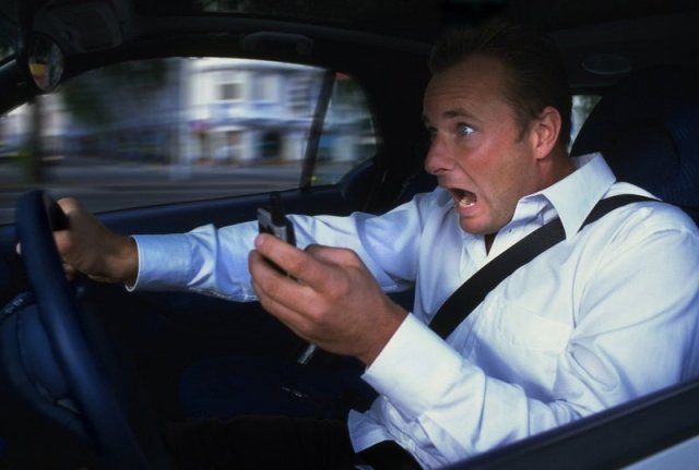 Using a Mobile Phone While Driving